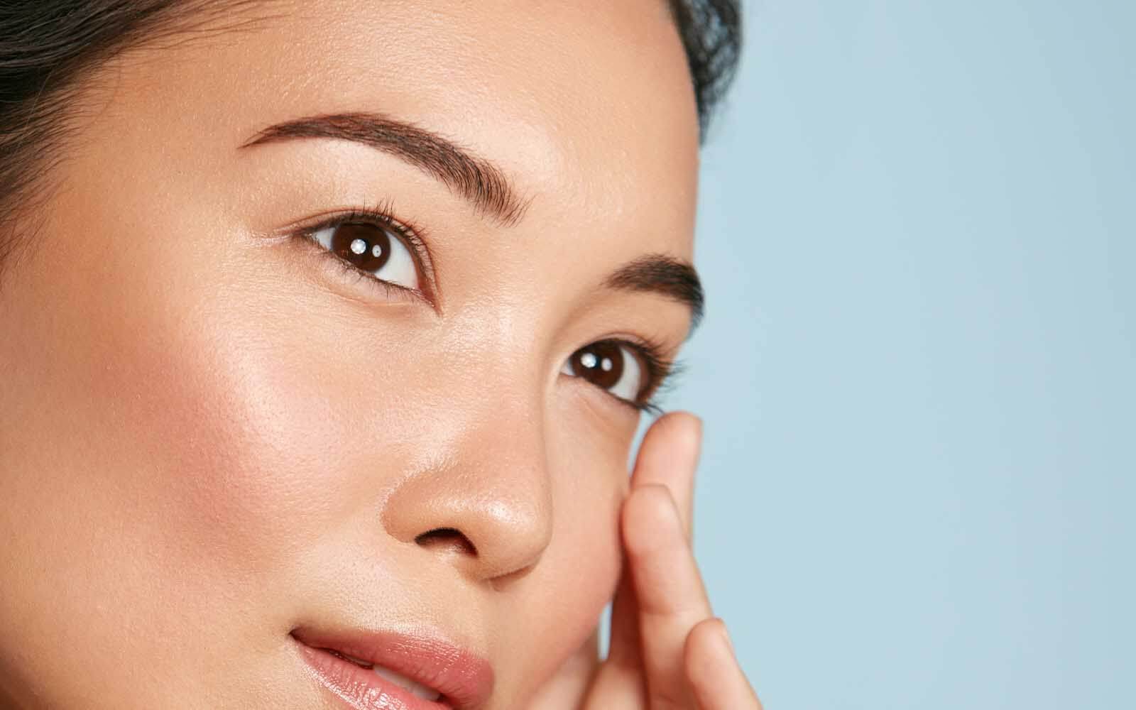 Woman after eyebrow treatments in Belgravia