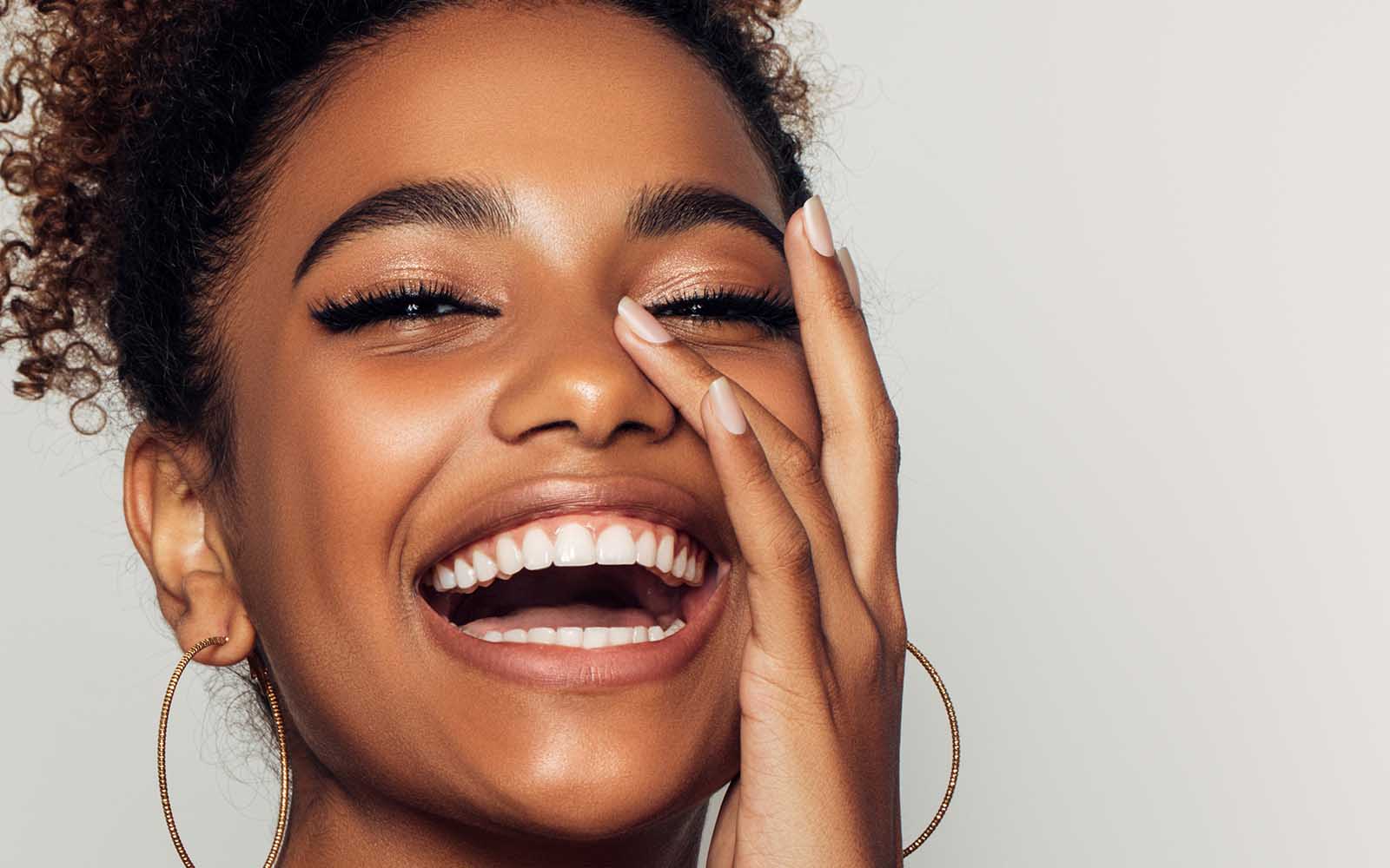woman smiling after polynucleotides treatment in Belgravia