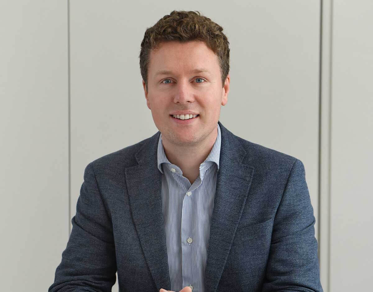 Jonathan Dunne smiling at consultation