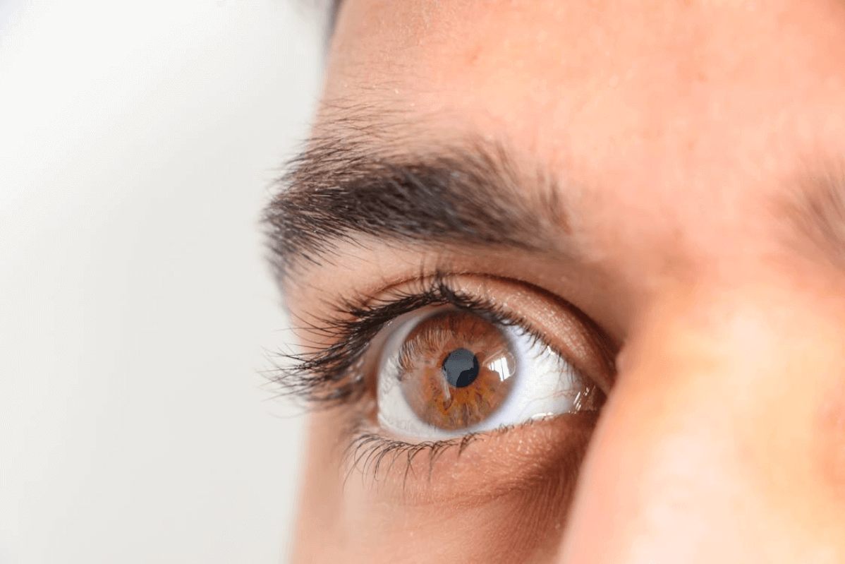mans eye after blepharoplasty surgery with Jonathan Dunne